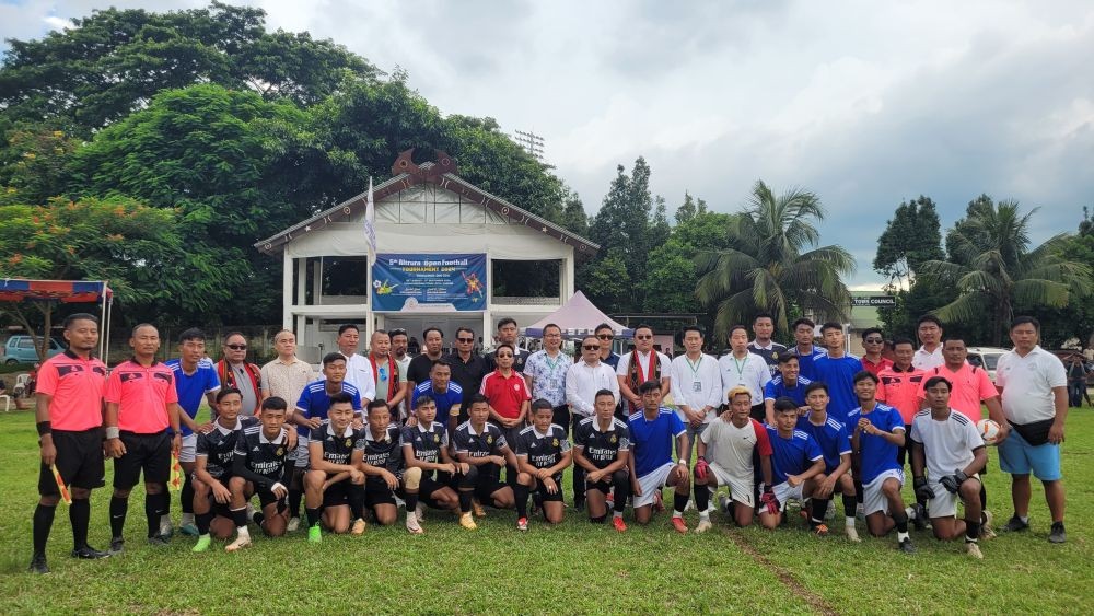 Nagaland Football Coaches Association president Roko Angami and others with finalists team. (Morung Photo)